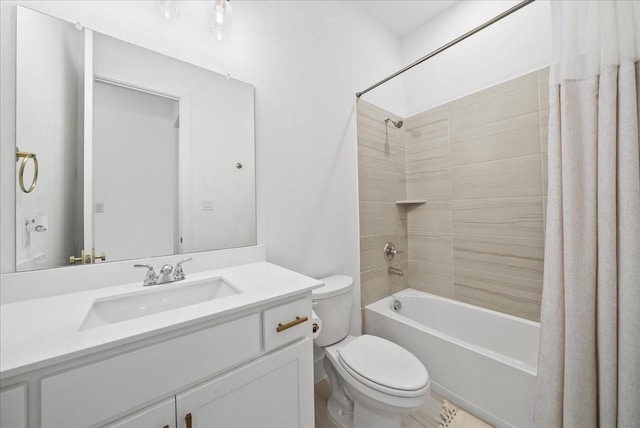 bathroom featuring shower / tub combo, vanity, and toilet