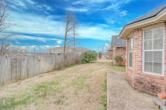 view of yard with fence