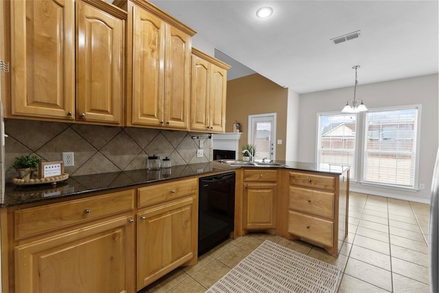 kitchen featuring light tile patterned floors, black dishwasher, decorative backsplash, a peninsula, and a sink