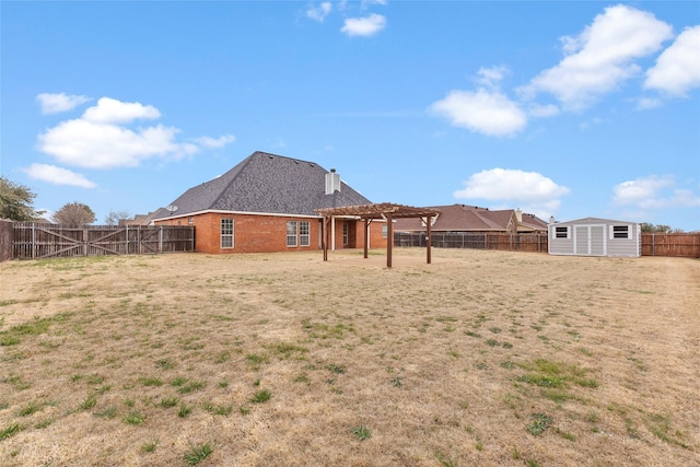 view of yard featuring a fenced backyard, a shed, a pergola, and an outbuilding