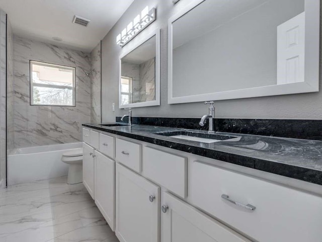 full bath featuring toilet, marble finish floor, a sink, and visible vents