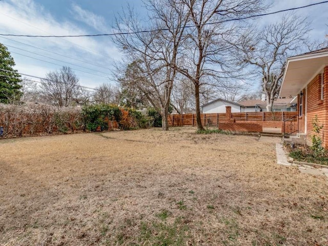 view of yard with fence