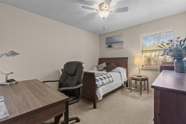 103 Holly Hill Ln, Bullard, TX 75757 - carpeted bedroom with a textured ceiling and ceiling fan