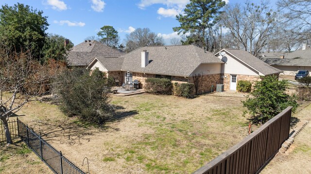 103 Holly Hill Ln, Bullard, TX 75757 - exterior space featuring brick siding, a fenced backyard, and a yard