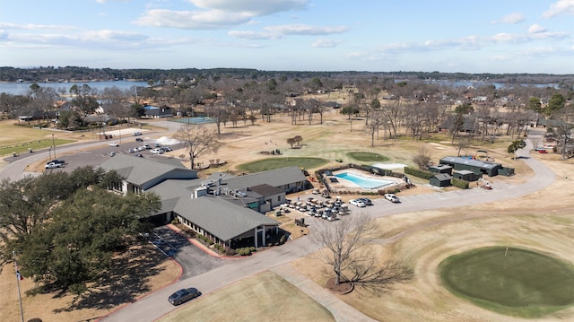 aerial view with a water view and golf course view