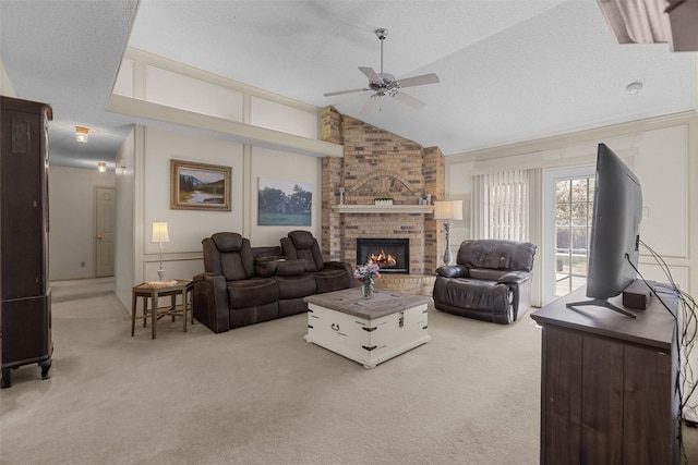 103 Holly Hill Ln, Bullard, TX 75757 - living area with light carpet, a ceiling fan, a fireplace, and vaulted ceiling
