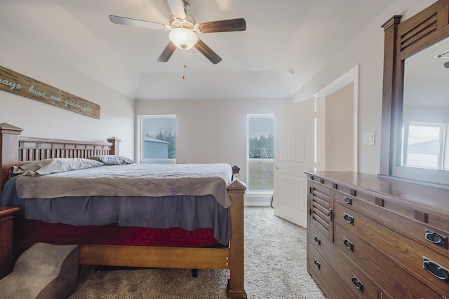 bedroom featuring light colored carpet and a ceiling fan