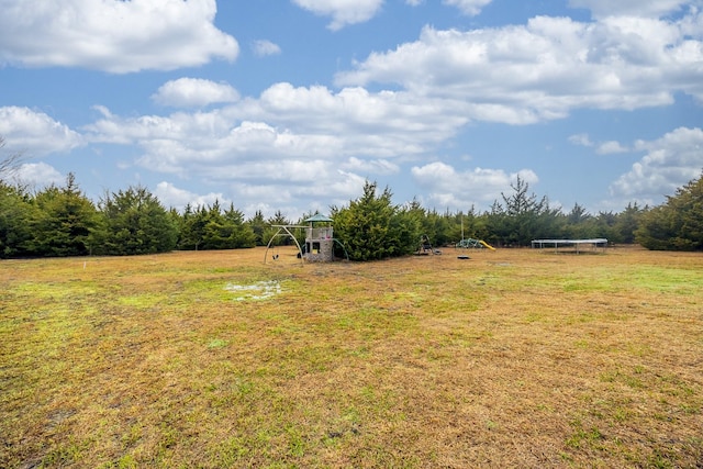 view of yard with a trampoline