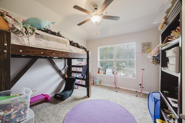 bedroom with baseboards, carpet floors, and ceiling fan