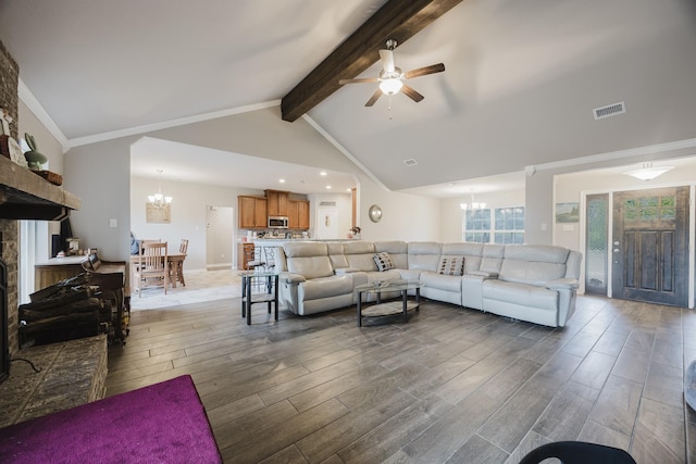 living room with visible vents, beam ceiling, high vaulted ceiling, and wood finished floors