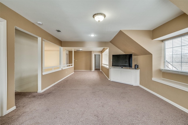 bonus room featuring carpet, visible vents, and baseboards