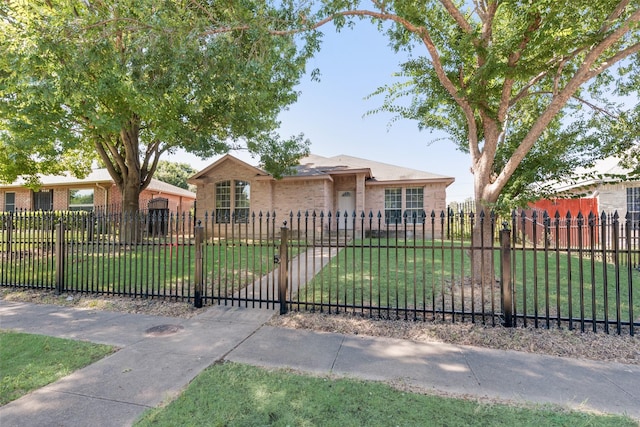8028 Texridge Dr, Dallas, TX 75232 - view of front of property with brick siding, a fenced front yard, and a front yard