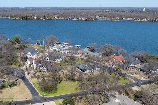 birds eye view of property featuring a residential view and a water view