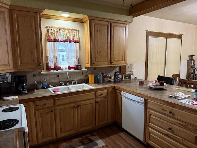 kitchen with white appliances, decorative backsplash, tile countertops, dark wood-style flooring, and a sink