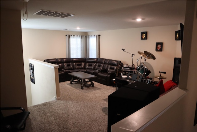 carpeted living room with visible vents and recessed lighting