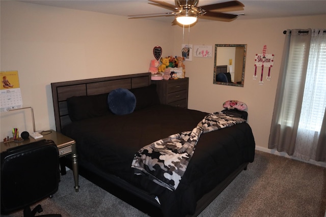 bedroom with ceiling fan and carpet