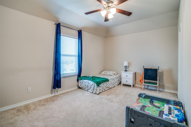 bedroom with carpet floors, a ceiling fan, and baseboards