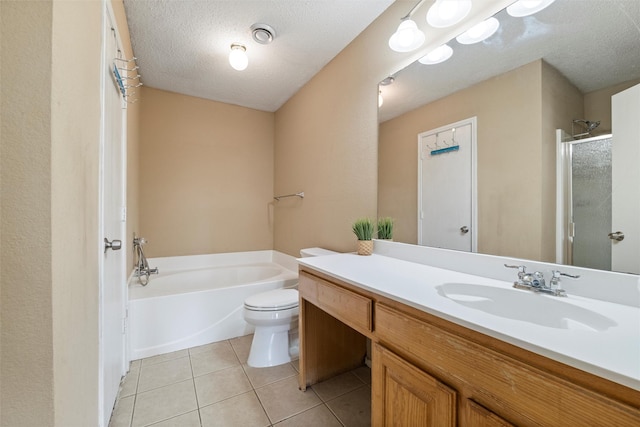 full bath with a textured ceiling, a garden tub, tile patterned flooring, vanity, and a shower with door