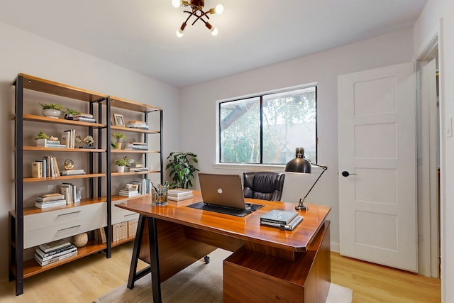 home office featuring light wood-style flooring