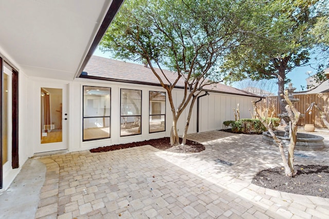 view of patio / terrace featuring fence