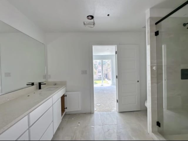 9475 Timberleaf Dr, Dallas, TX 75243 - bathroom with vanity and a stall shower