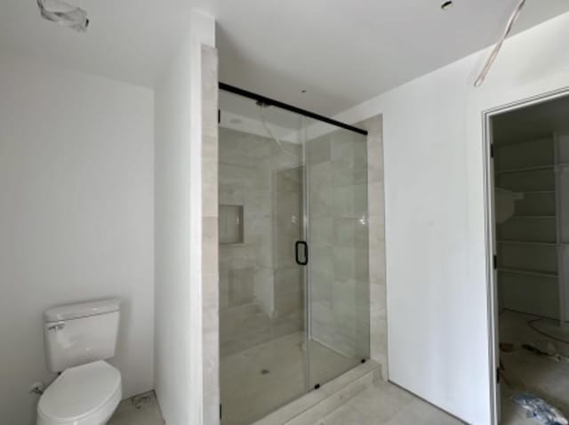 9475 Timberleaf Dr, Dallas, TX 75243 - full bath featuring toilet and a stall shower