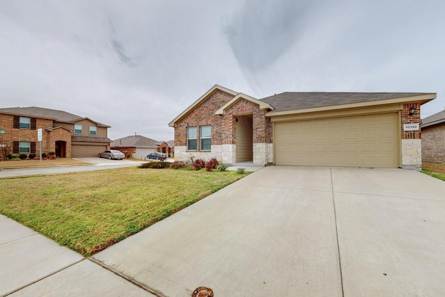 view of front of home with a garage, brick siding, concrete driveway, stone siding, and a front yard