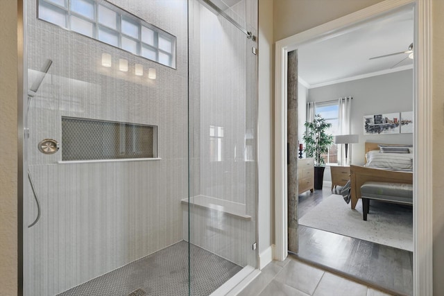 full bath with ornamental molding, a shower with shower door, ensuite bath, and wood finished floors