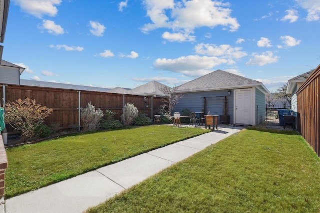 view of yard with a fenced backyard