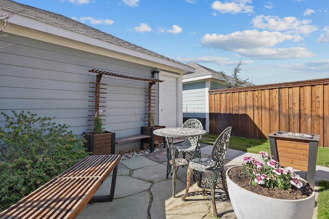 view of patio with fence