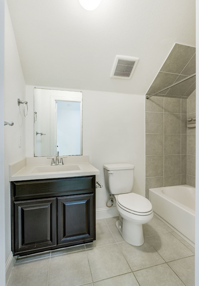 bathroom featuring visible vents, baseboards, toilet, tile patterned flooring, and vanity