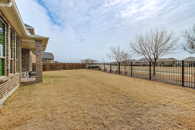 view of yard featuring a fenced backyard