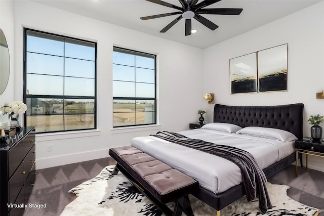 bedroom with recessed lighting, dark carpet, baseboards, and ceiling fan