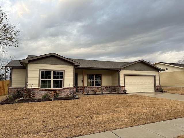 ranch-style house with driveway, a garage, roof with shingles, fence, and brick siding