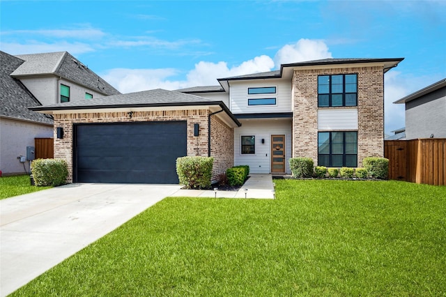 view of front of home featuring brick siding, a front lawn, fence, concrete driveway, and an attached garage