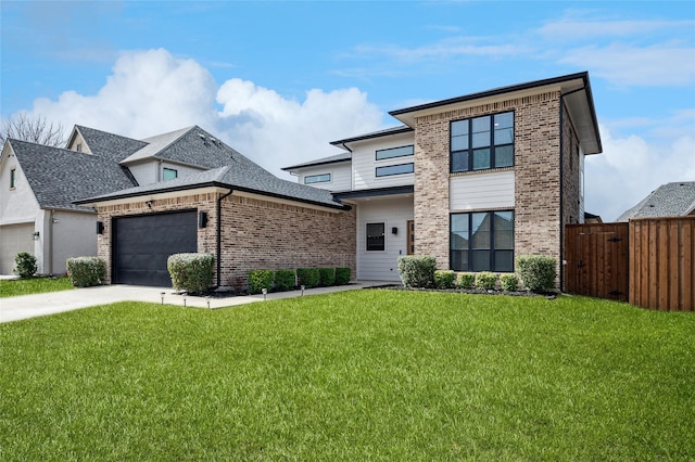 view of front facade with fence, driveway, an attached garage, a front lawn, and brick siding