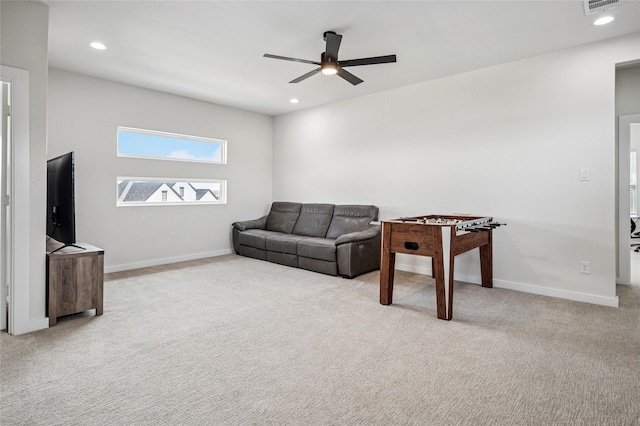 carpeted living room featuring a ceiling fan, visible vents, recessed lighting, and baseboards