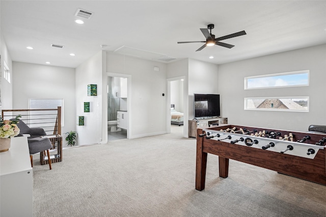 rec room with attic access, recessed lighting, visible vents, and carpet floors