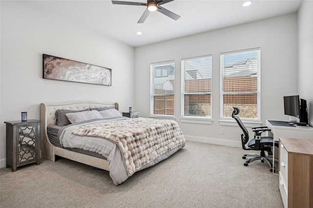 bedroom featuring recessed lighting, baseboards, light colored carpet, and ceiling fan