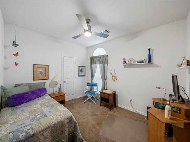 bedroom with carpet floors, ceiling fan, visible vents, and baseboards