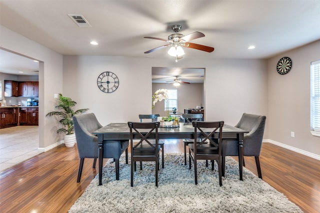 dining area featuring recessed lighting, visible vents, baseboards, and wood finished floors