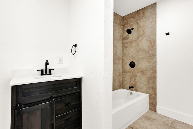 bathroom featuring shower / bathtub combination, baseboards, vanity, and tile patterned floors