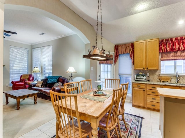 3605 Kales Ln, Flower Mound, TX 75022 - dining space with visible vents, light tile patterned floors, lofted ceiling, and a toaster
