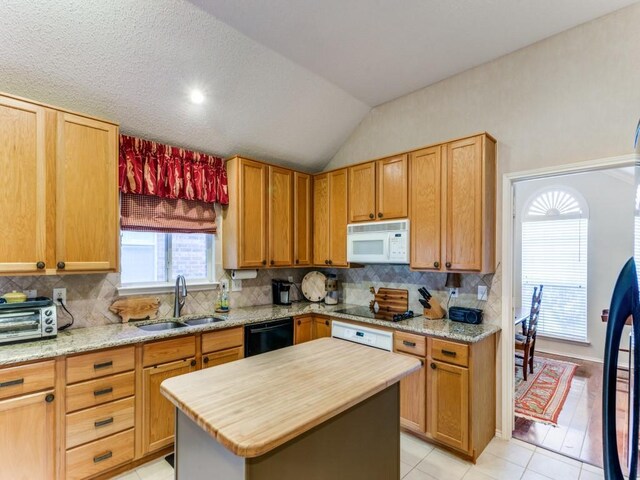 3605 Kales Ln, Flower Mound, TX 75022 - dining space featuring light tile patterned flooring, arched walkways, lofted ceiling, a toaster, and visible vents