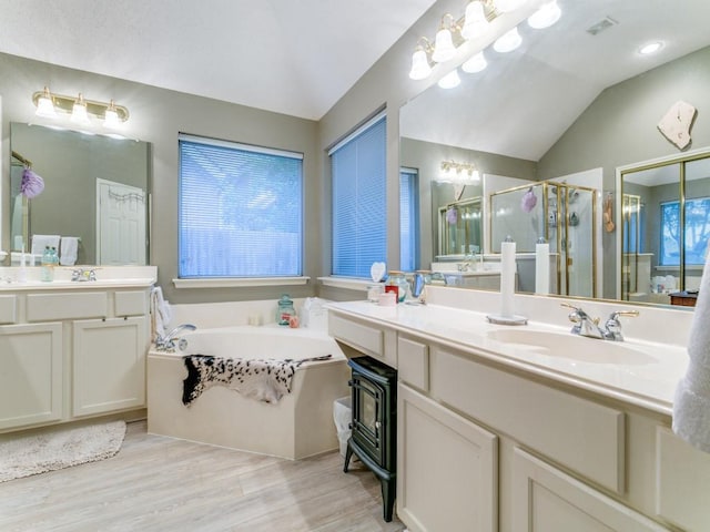 3605 Kales Ln, Flower Mound, TX 75022 - full bathroom with a stall shower, a garden tub, and two vanities