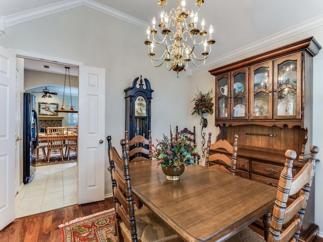 3605 Kales Ln, Flower Mound, TX 75022 - dining area featuring crown molding, a notable chandelier, vaulted ceiling, and a healthy amount of sunlight