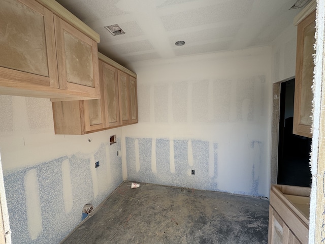 laundry area with visible vents