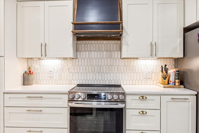 4105 Cimmaron Trl, Granbury, TX 76049 - kitchen featuring appliances with stainless steel finishes, custom range hood, light countertops, and backsplash