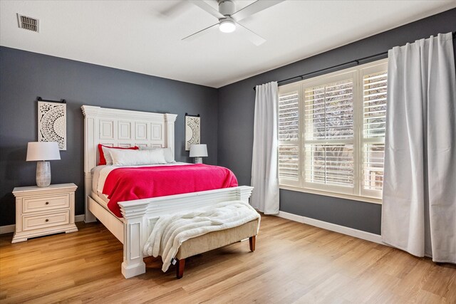 4105 Cimmaron Trl, Granbury, TX 76049 - bedroom featuring wood finished floors, baseboards, and ceiling fan
