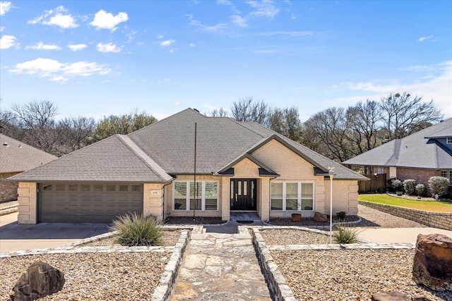 4105 Cimmaron Trl, Granbury, TX 76049 - ranch-style house with brick siding, driveway, a garage, and a shingled roof